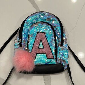 Justice Mini Backpack Flip Sequin, Pompom, Letter A